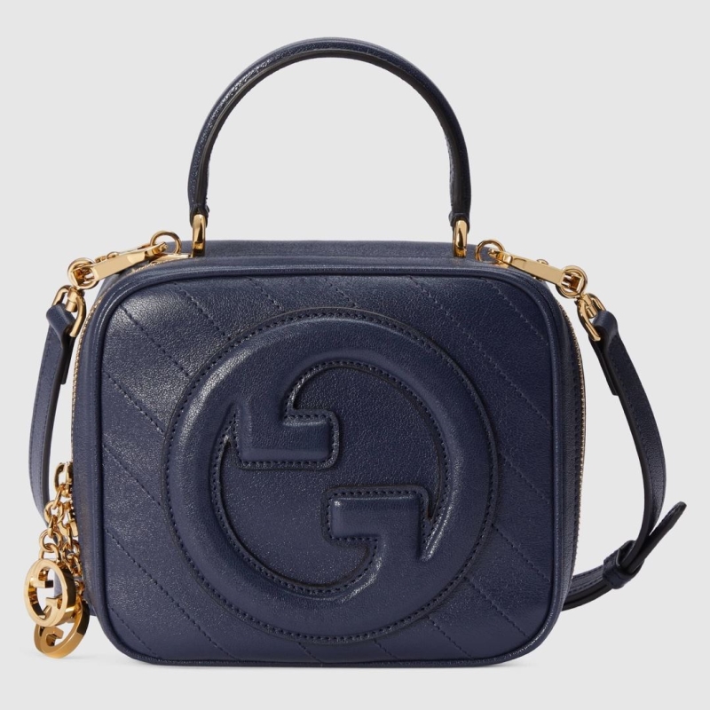 G*u*i top handle bags